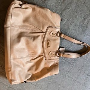 Off white coach bag.